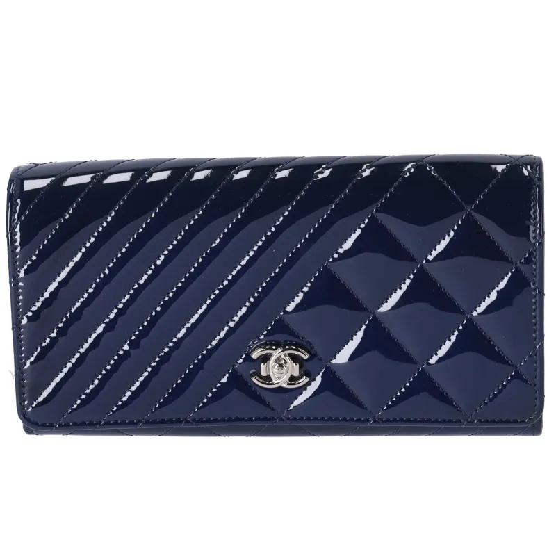 CHANEL Coco Boy Long Wallet Navy Patent Leather sold by Gaby's Bags
