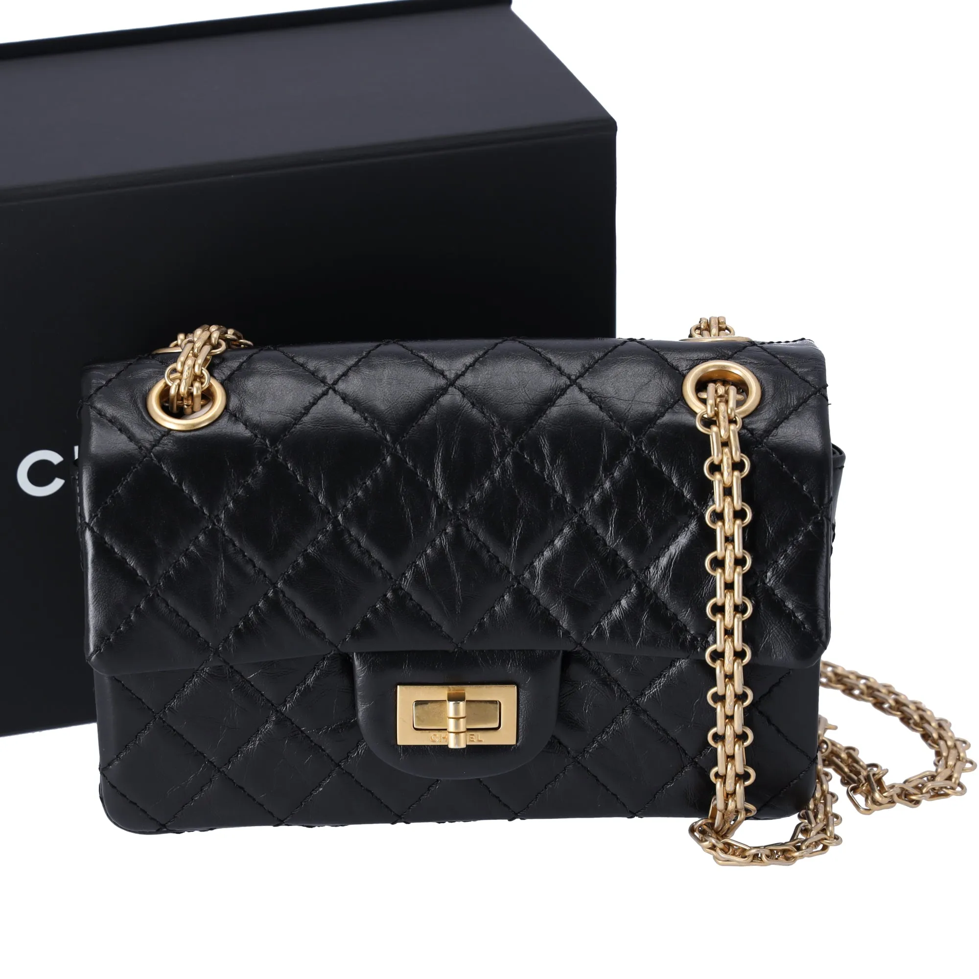 CHANEL 2.55 Classic Mini Reissue Flap Bag Black Aged Calfskin Leather sold by Gaby's Bags