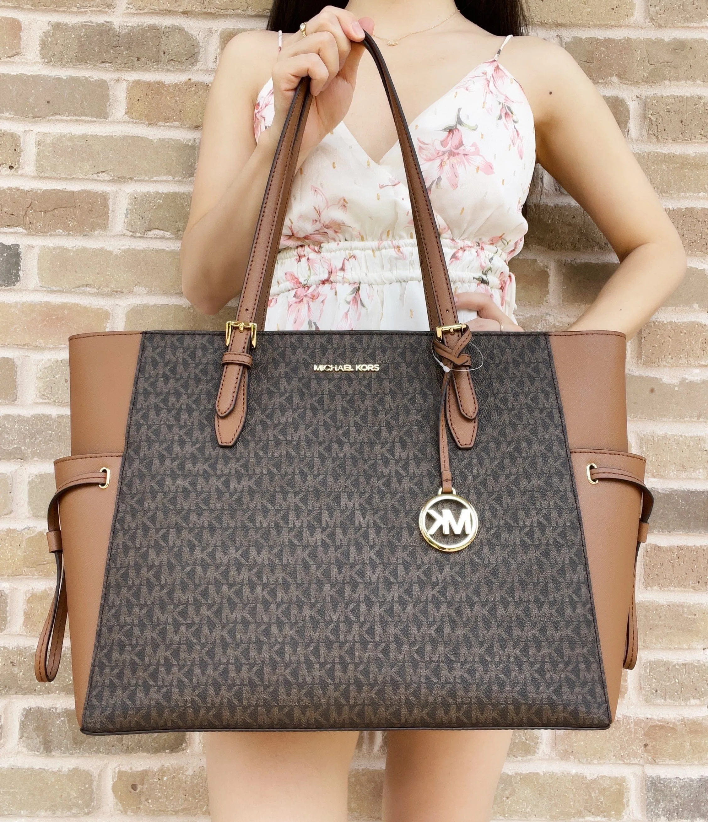 Michael Kors Gilly Large Jet Set Travel Drawstring Tote Brown MK Signature sold by Gaby's Bags product image thumbnail 2