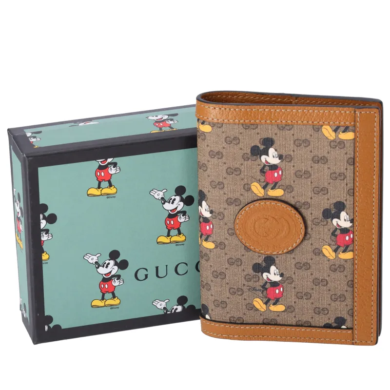 GUCCI x Disney GG Mickey Mouse Passport Holder Brown sold by Gaby's Bags
