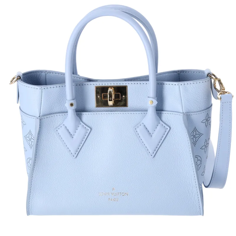 Louis Vuitton On My Side PM Tote Mahina Monogram M59432 Blue Nuage sold by Gaby's Bags