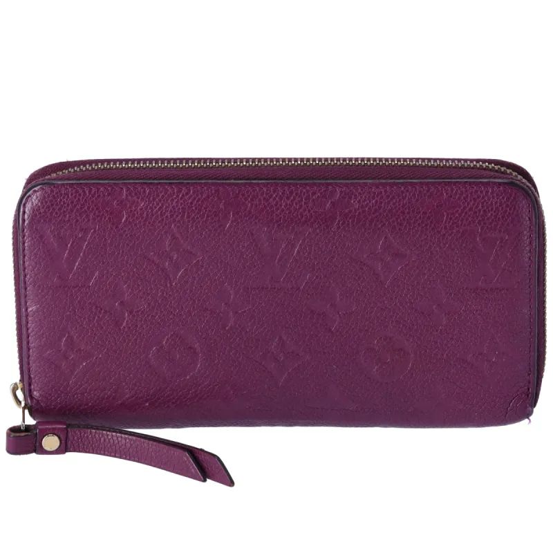 Louis Vuitton M60649 Monogram Empreinte Portefeuille Zippy Long Wallet Aurore sold by Gaby's Bags