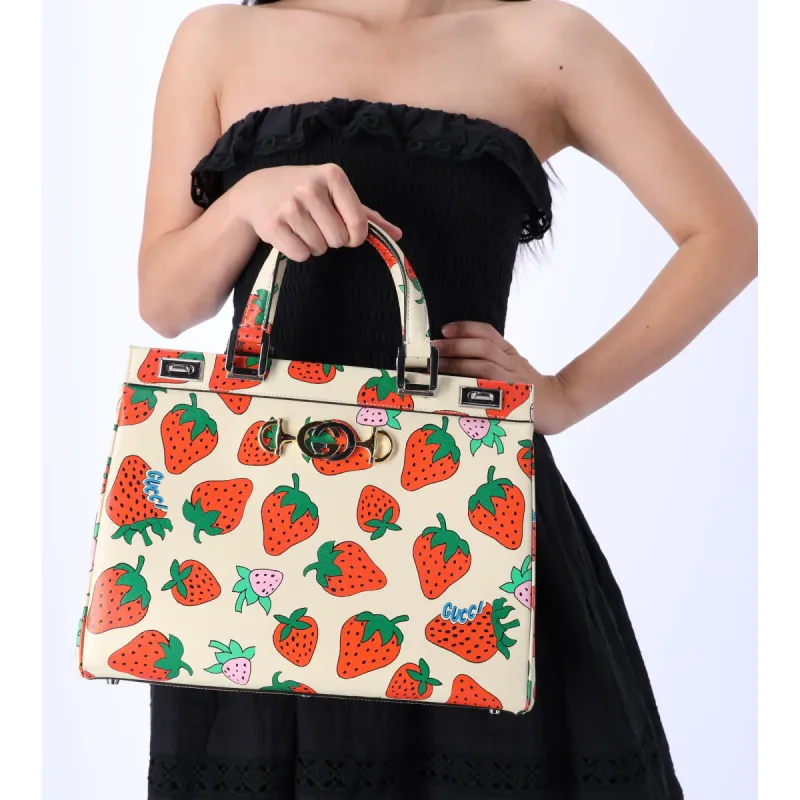 Gucci Printed Leather Strawberry Zumi Medium Tote Convertible Shoulder Bag sold by Gaby's Bags