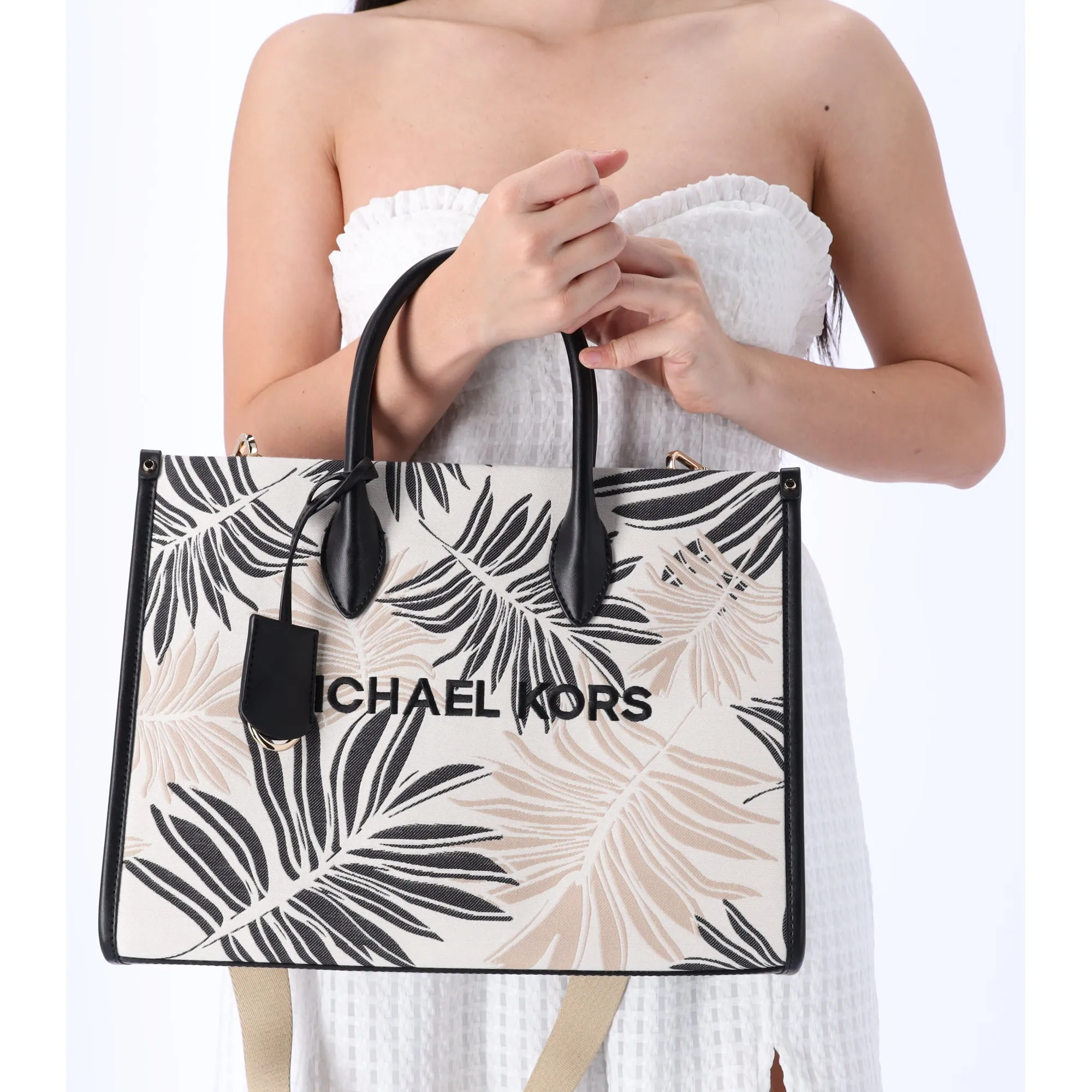 Michael Kors Mirella Medium East West Tote Black Multi Palm Tree Leaves sold by Gaby's Bags