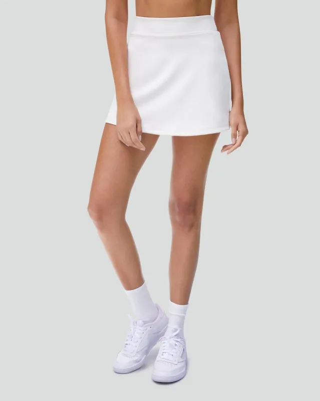 High Rise Tennis Skort sold by IVL COLLECTIVE