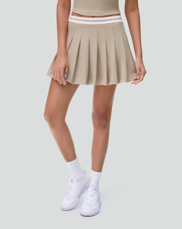 Pleated Tennis Skort sold by IVL COLLECTIVE