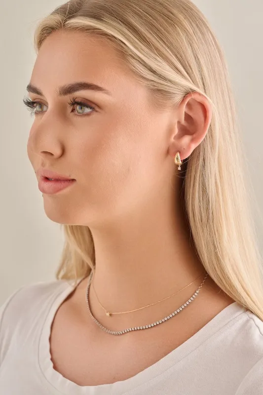 Thick Gold Hoop with Diamond Drop sold by Modatrova