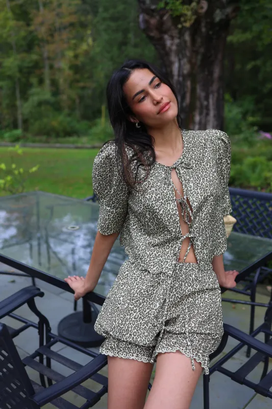 Scalloped Top Leopard sold by Modatrova