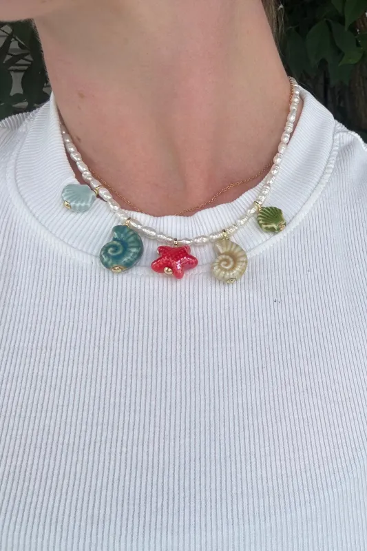 Sea Party Charm Necklace sold by Modatrova