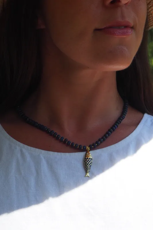 Paros Fish Charm Necklace sold by Modatrova
