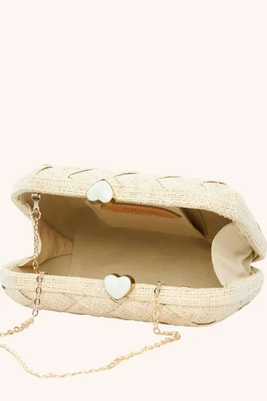 The Love Heart Clutch sold by Modatrova