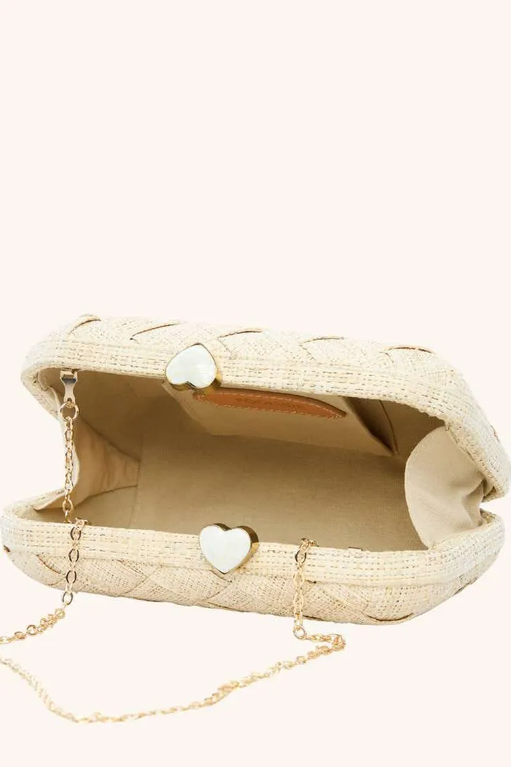 The Love Heart Clutch sold by Modatrova