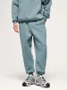 Solid-Color Warm-Padded Sweatpants With A Drawstring sold by Oeyes