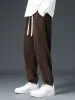 Men'S Casual Loose Sports Trousers Drawstring Sweatpants sold by Oeyes