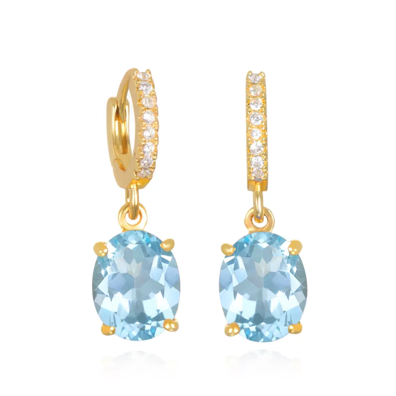 Sky Blue Topaz Huggies sold by Amelia Rose Design