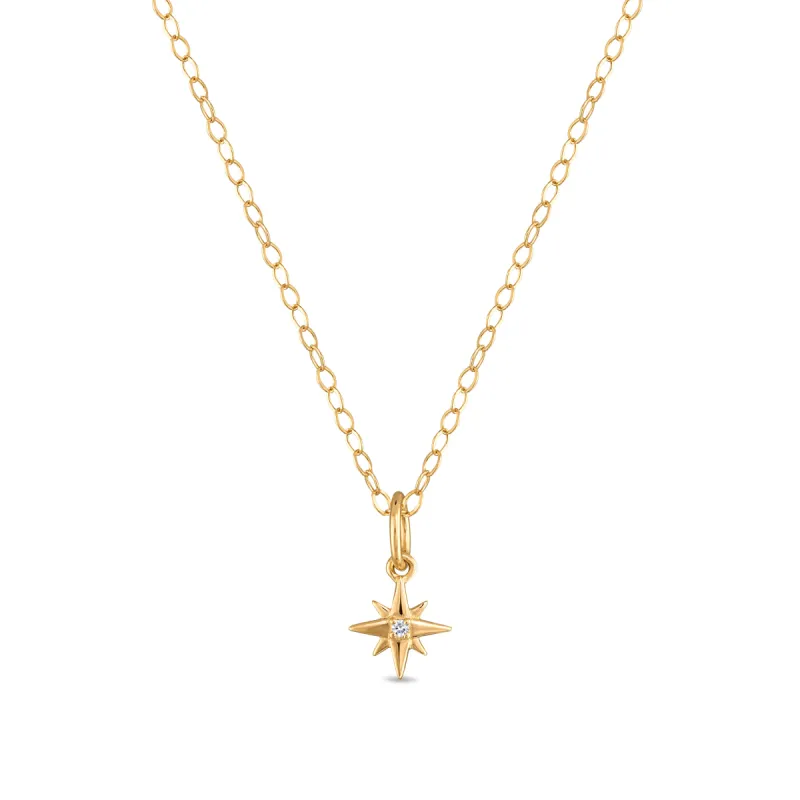 New!  14k Gold Diamond Starburst Necklace sold by Amelia Rose Design