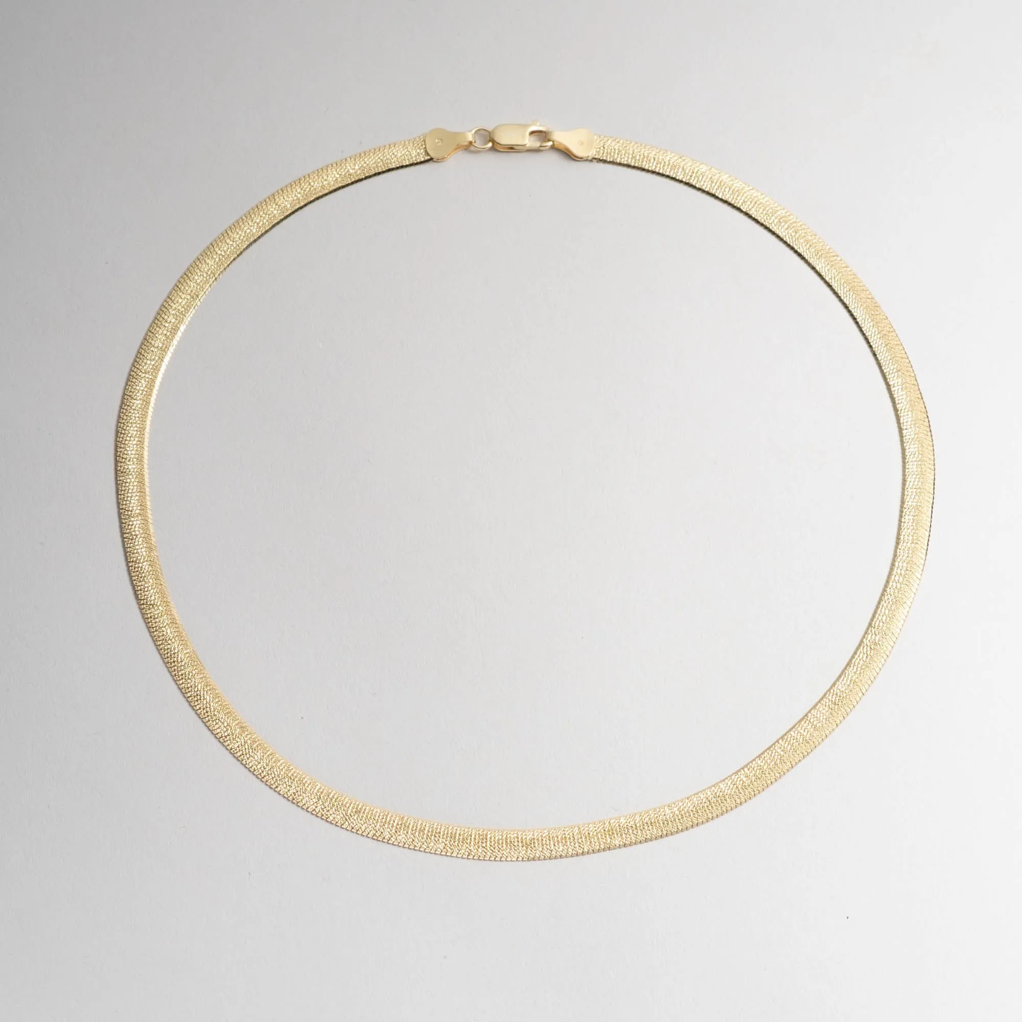 Angelique Gold Diamond-Cut Herringbone Necklace sold by Bonheur Jewelry