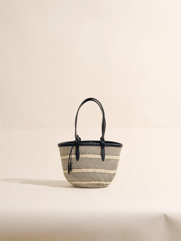 The Small Basket in Striped Iraca sold by Hunting Season