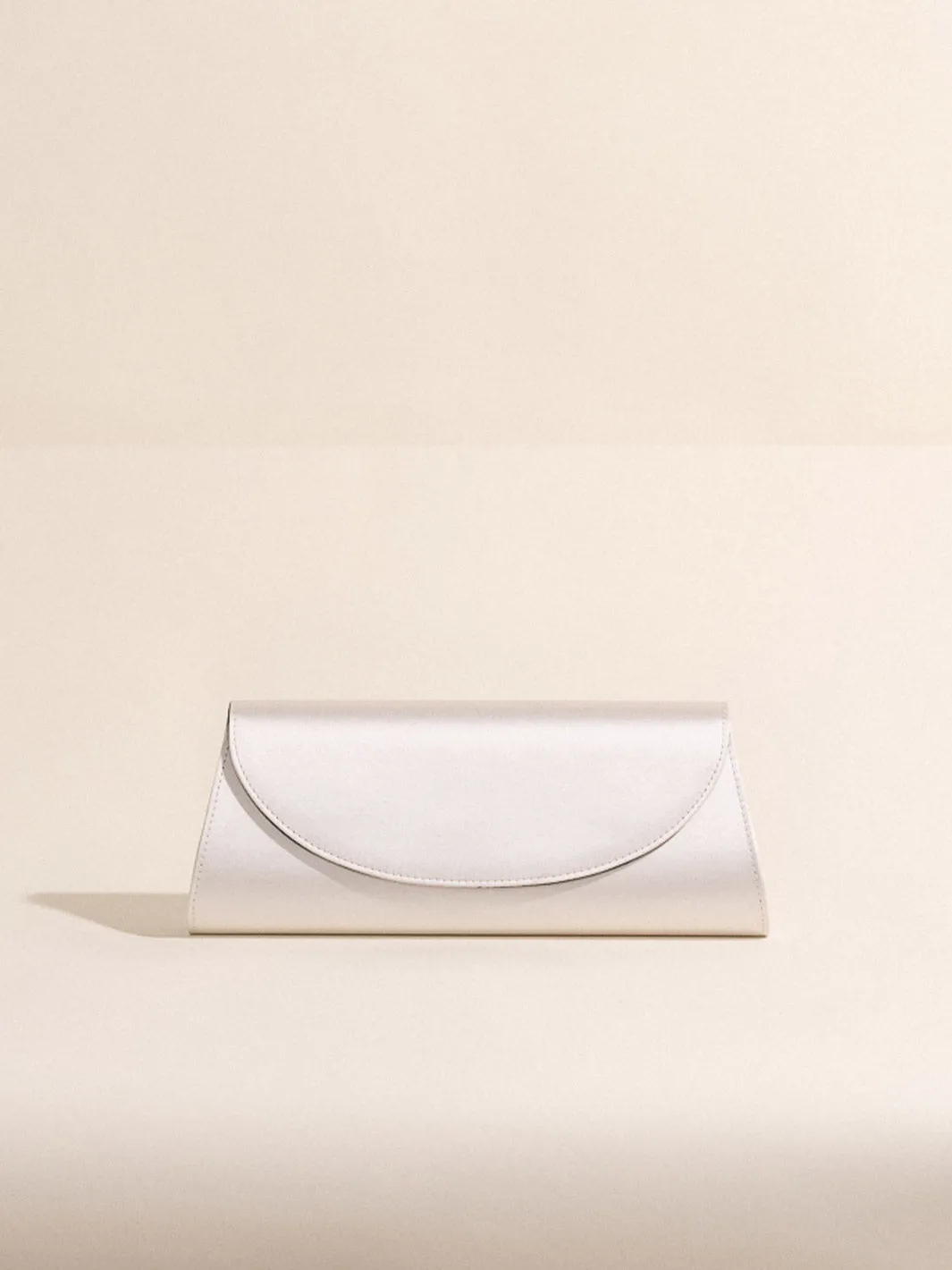 The Opera Clutch in Satin sold by Hunting Season