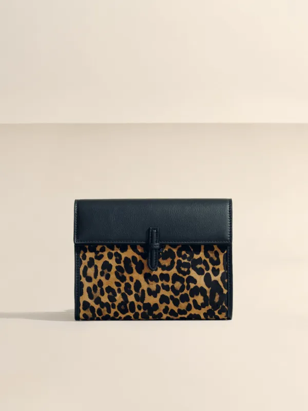 The Small Soft Clutch in Leopard Suede sold by Hunting Season