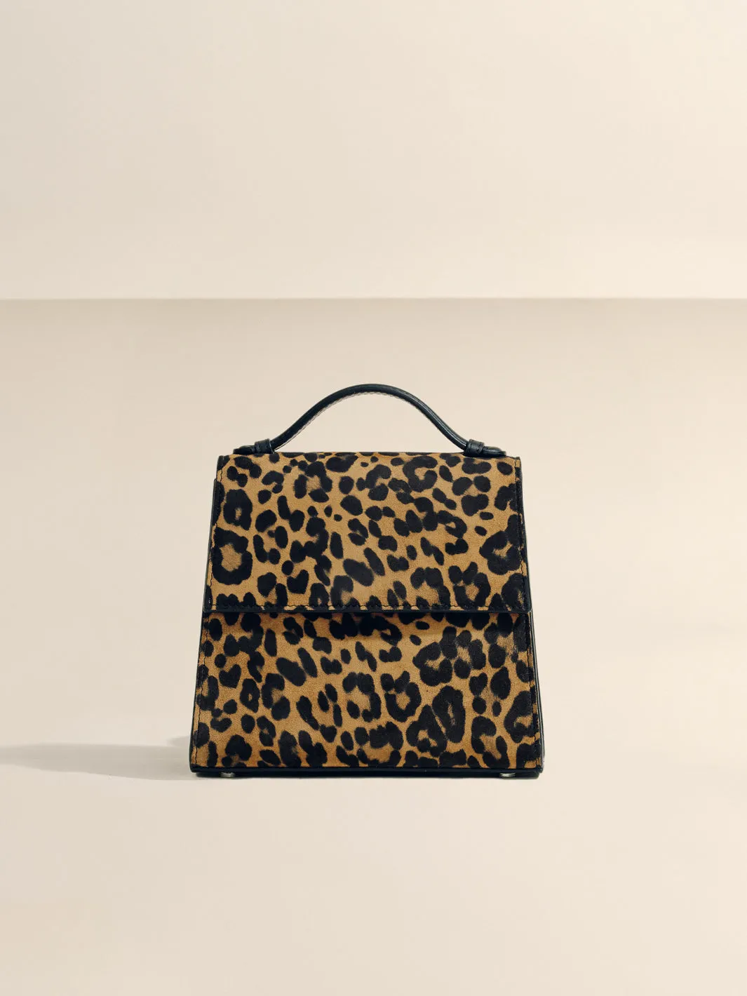 The Small Top Handle in Leopard Suede sold by Hunting Season