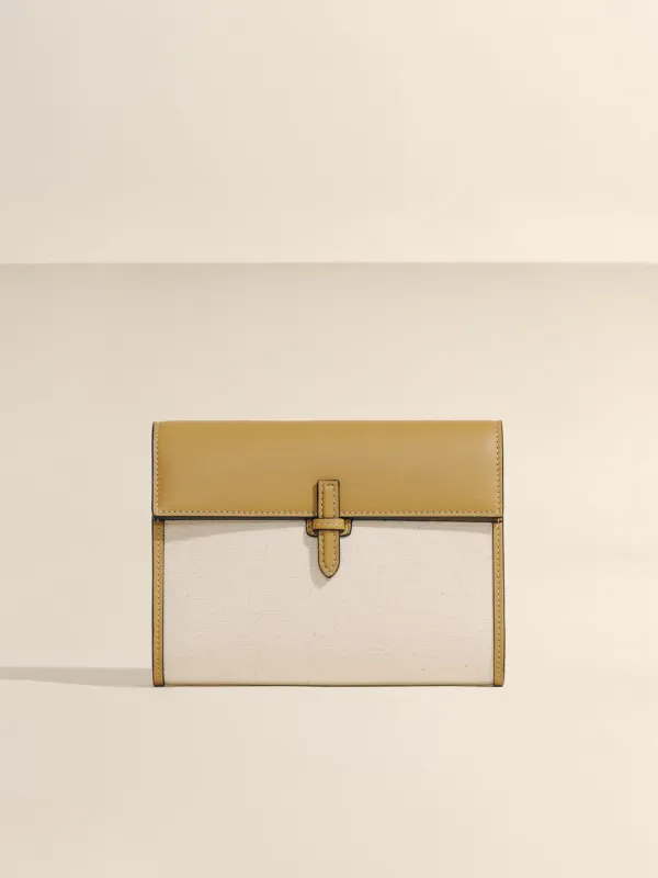 The Small Soft Clutch in Natural Fiber sold by Hunting Season