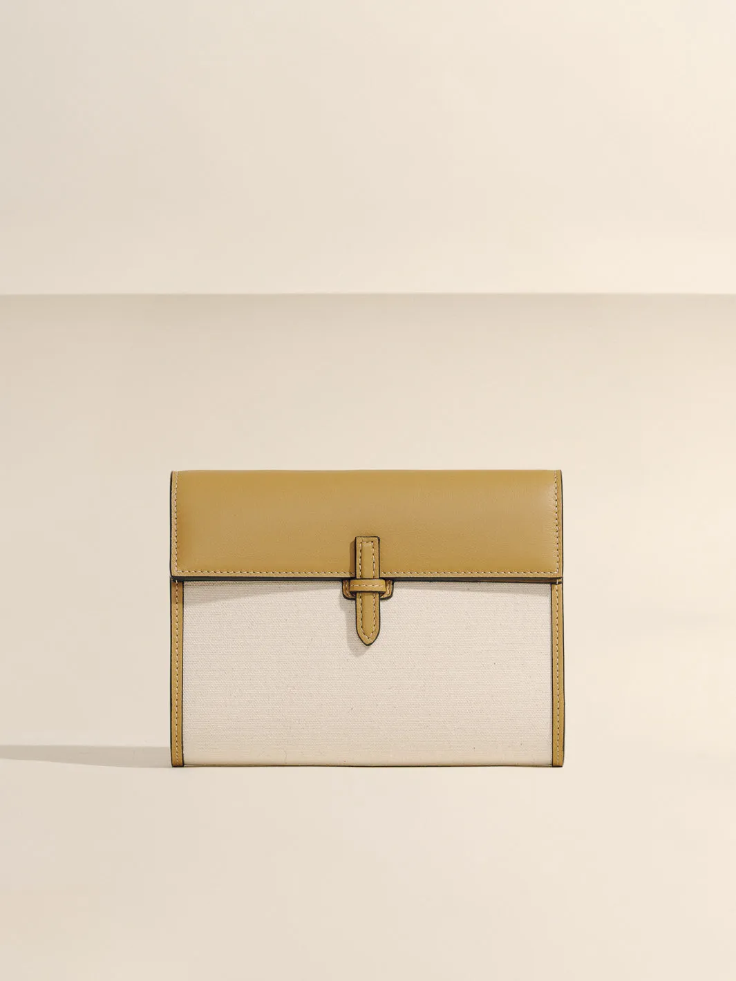 The Small Soft Clutch in Natural Fiber sold by Hunting Season