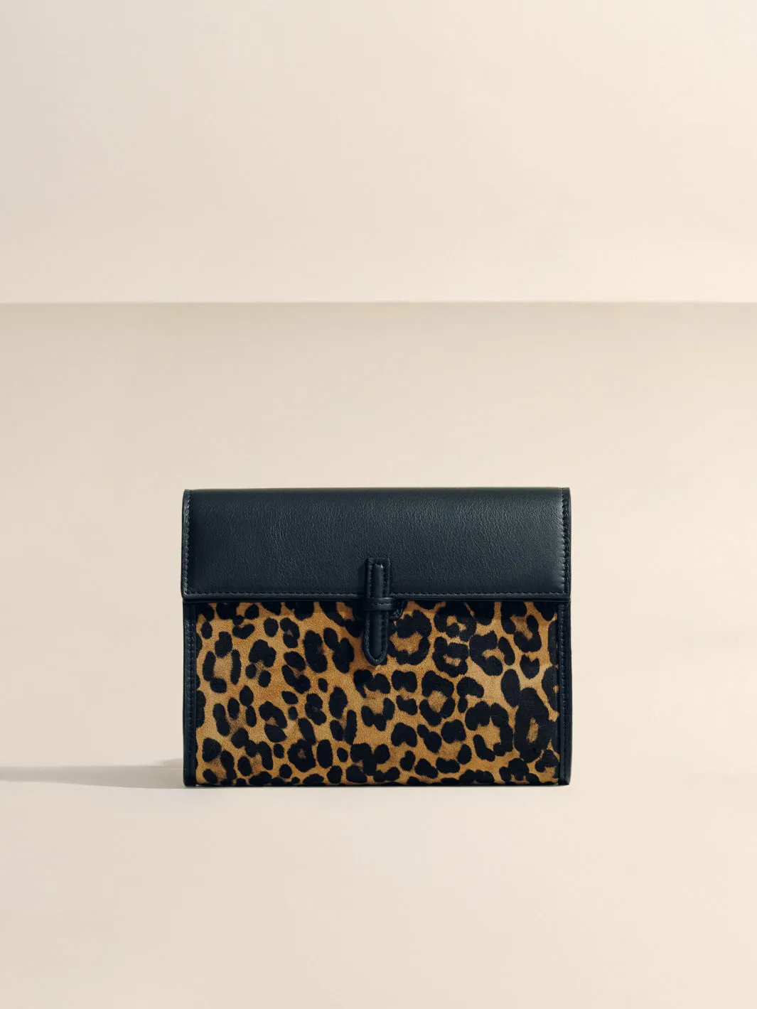 The Small Soft Clutch in Leopard Suede sold by Hunting Season