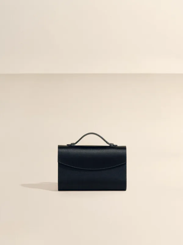 The Top Handle Clutch in Satin made by Hunting Season