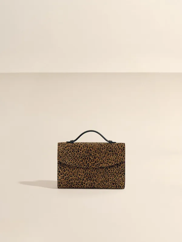 The Top Handle Clutch in Suede made by Hunting Season