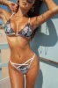Lucy in White Bottoms sold by Ivy Swimwear
