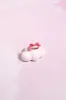 Icing on the Cupcake Enamel Stacking Ring sold by Mulberry and Grand