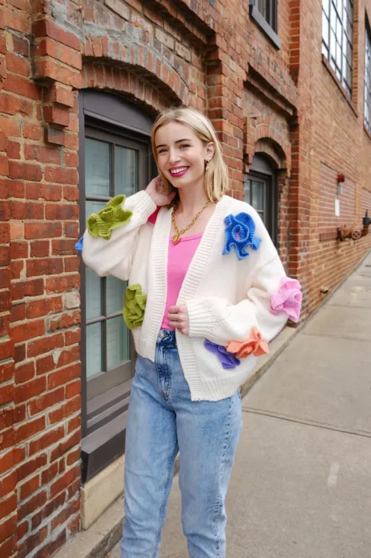 Flower Power Puff Cardigan sold by Mulberry and Grand