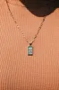 The Sun Tarot Card Pendant Necklace sold by Mulberry and Grand