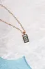The Sun Tarot Card Pendant Necklace sold by Mulberry and Grand