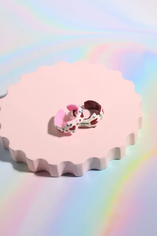 The Love Letter Painted Stacking Ring sold by Mulberry and Grand
