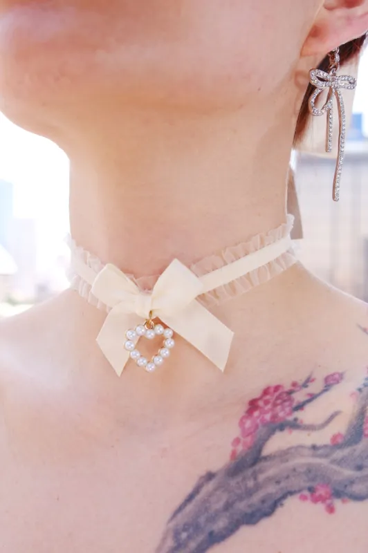 Carmen Ruffle Pearl Heart Necklace sold by Mulberry and Grand