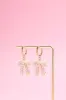 Pearly Bow Charm Dangle Earrings sold by Mulberry and Grand
