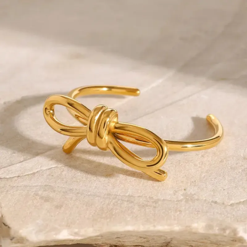 Sweet Bow Knot Bangle sold by Mulberry and Grand