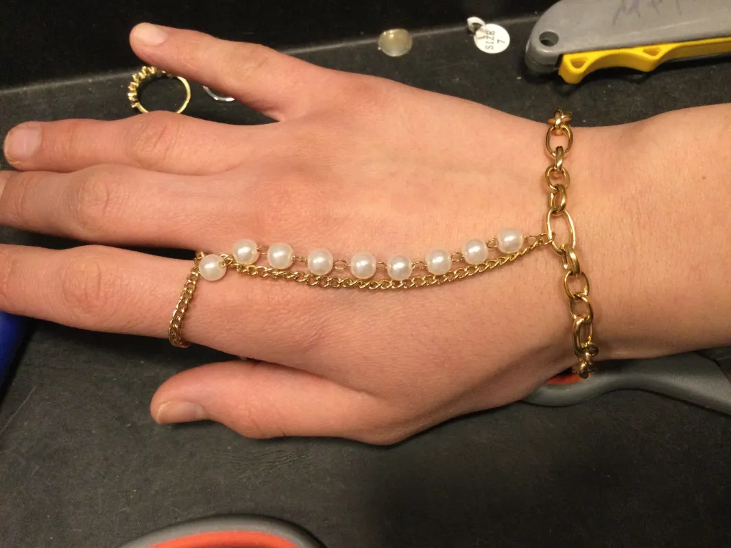 Pearls Link Hand Chain Bracelet sold by Mulberry and Grand