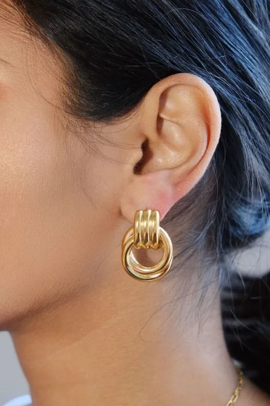 Gold Knot Statement Earrings sold by Mulberry and Grand