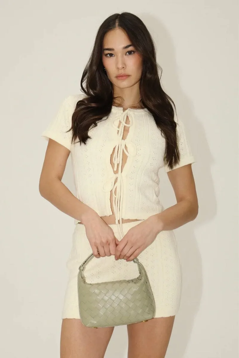 Vicenta Eyelet Pattern And Tie Front Design Knit Top sold by Mulberry and Grand