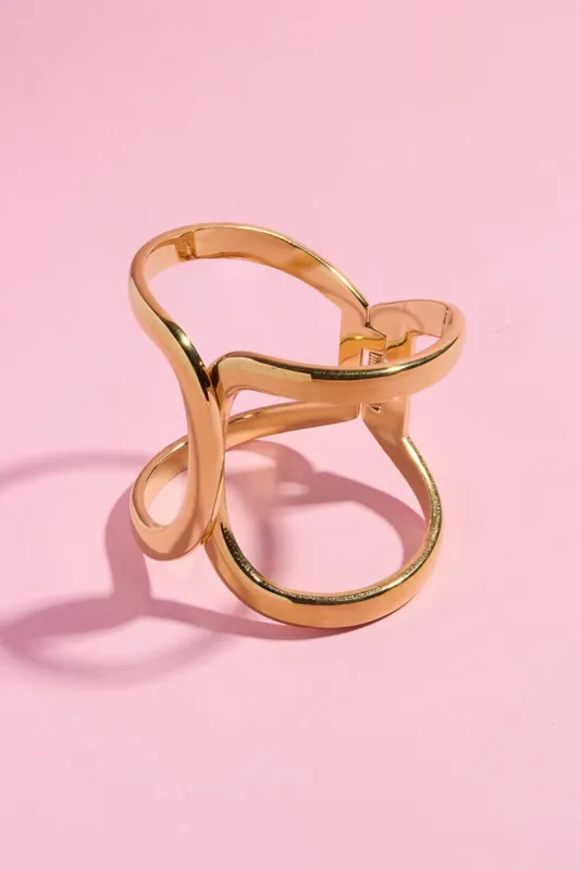 Twist Hinge Cuff Bangles sold by Mulberry and Grand