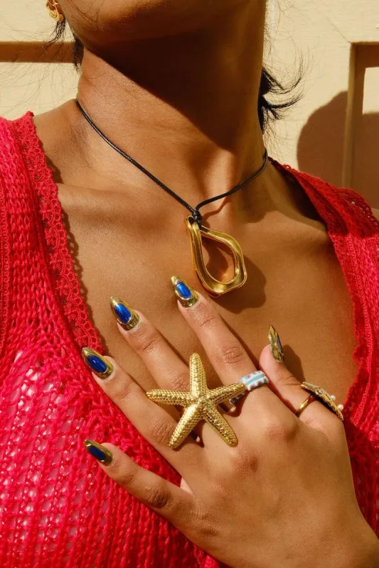 Hollow Out Asymmetrical Necklace sold by Mulberry and Grand