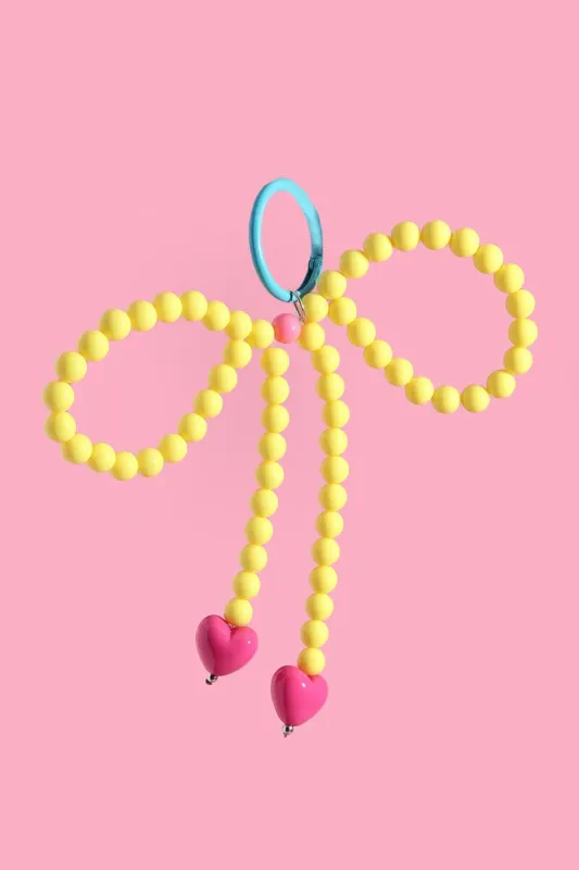 Yellow Sweet Bow Bag Charm sold by Mulberry and Grand