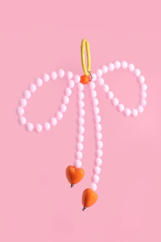 Pink Pop Heart Bow Bag Charm sold by Mulberry and Grand