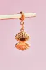 Pearl Shell Charm With Spring Clip sold by Mulberry and Grand