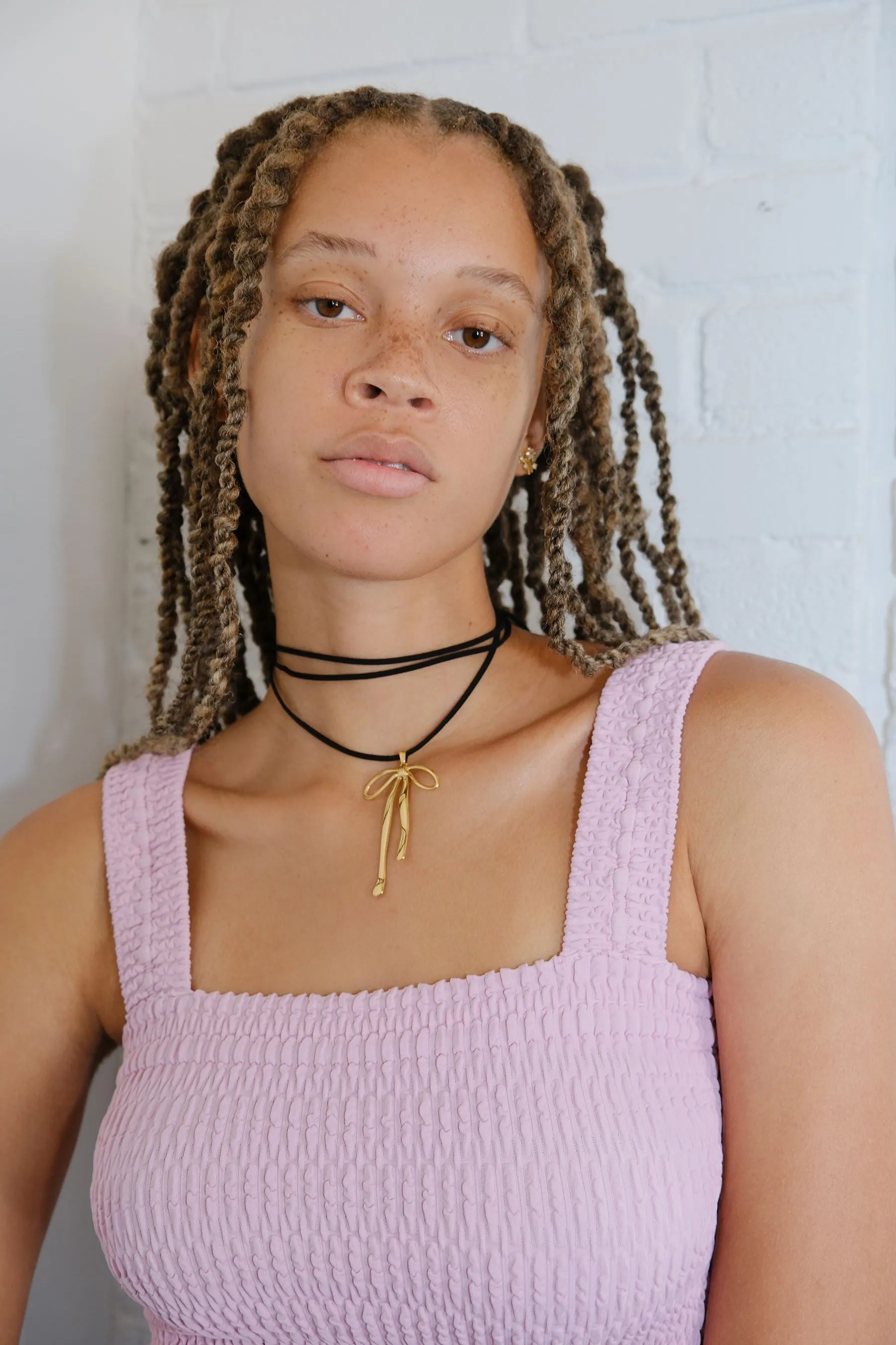 Coquette Bow Charm Necklace sold by Mulberry and Grand