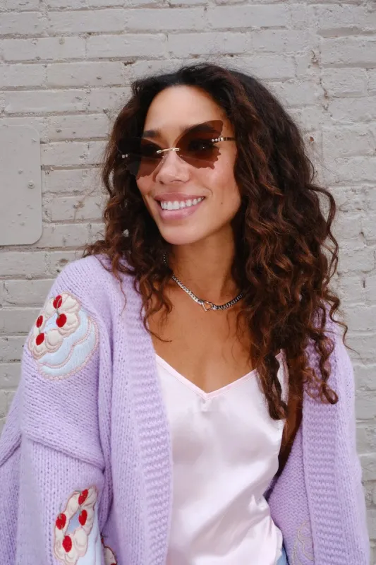 Butterfly Wings Rimless Sunglasses sold by Mulberry and Grand