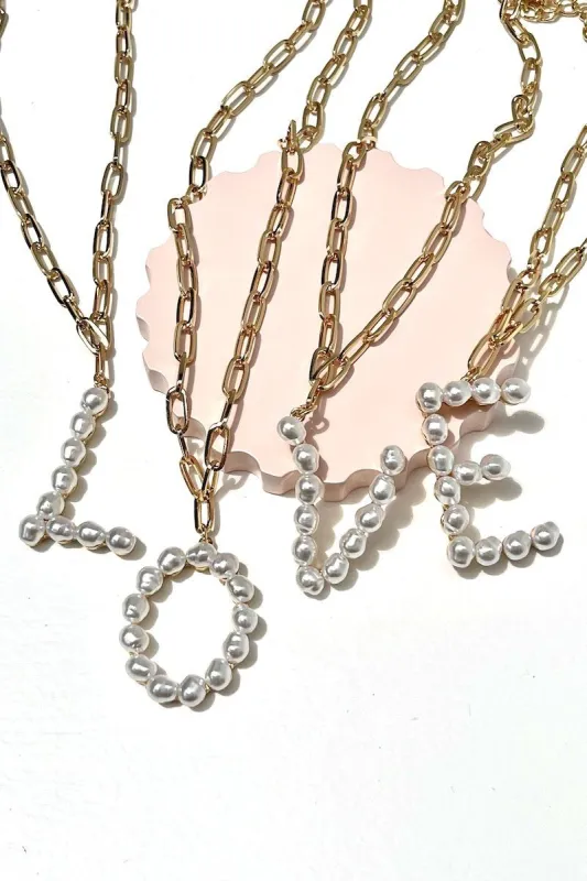 Pearl Initial Necklace sold by Mulberry and Grand